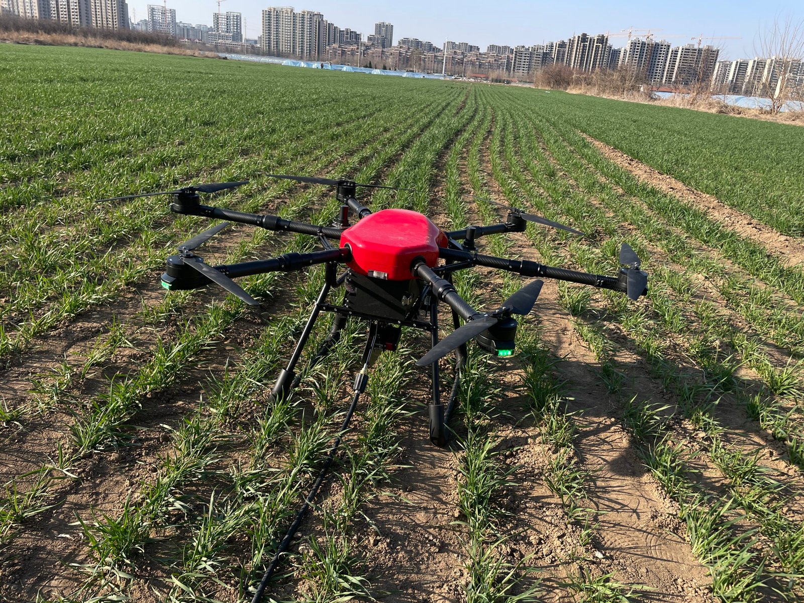 Industrial commercial cleaning drone for high-rise, roof, and solar panel cleaning