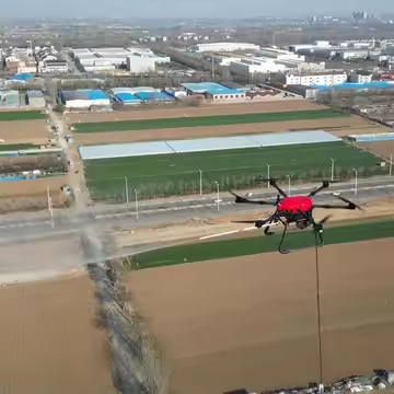Autonomous high-altitude cleaning drone in flight for industrial and building cleaning
